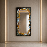 Decorative mirror with a unique frame on a beige wall
