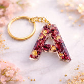 Resin alphabet A keychain with dried rose petals and gold flakes, handmade personalized initial keychain gift