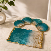 Decorative tray with blue and gold design on a light surface