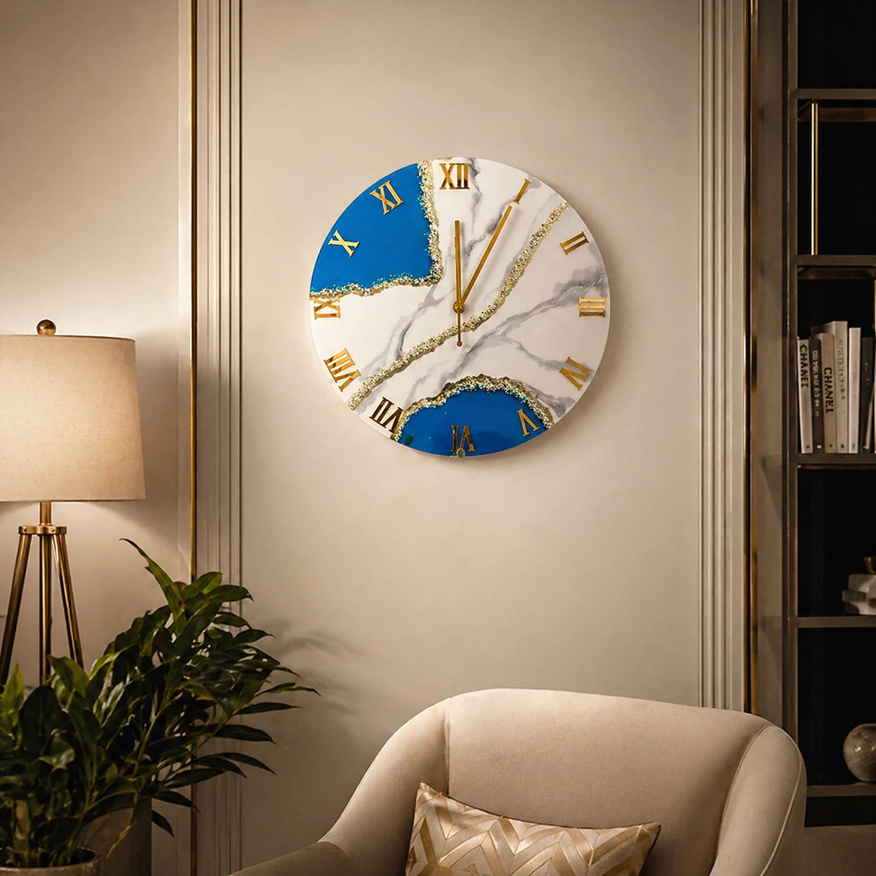 Decorative wall clock with blue and white design on a wall in a room with a lamp and plant.