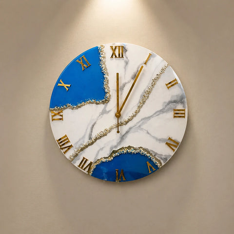 Decorative wall clock with marble and blue design on a beige background