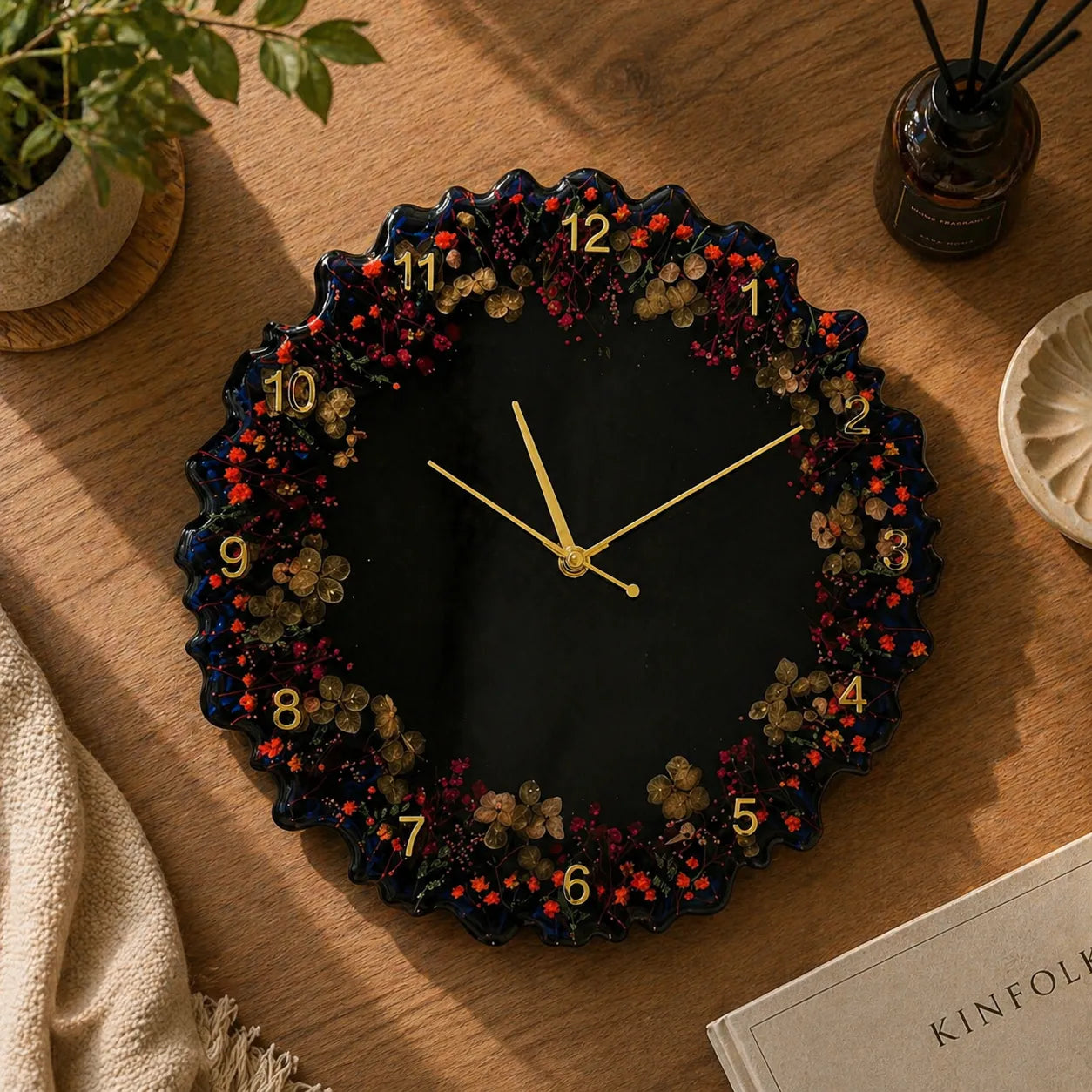 Decorative wall clock with floral design on a wooden surface