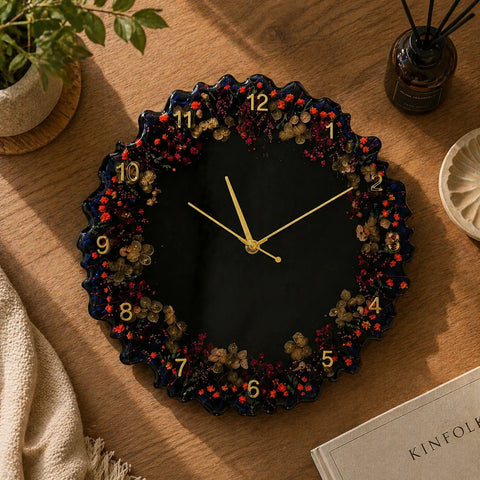 Decorative wall clock with floral design on a wooden surface