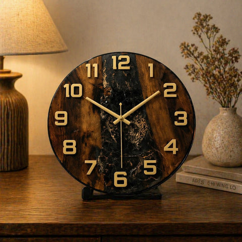 Wooden clock on a table with a lamp and vase in the background