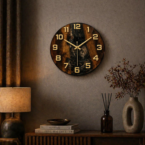 Wooden wall clock with gold numbers on a rustic interior setting