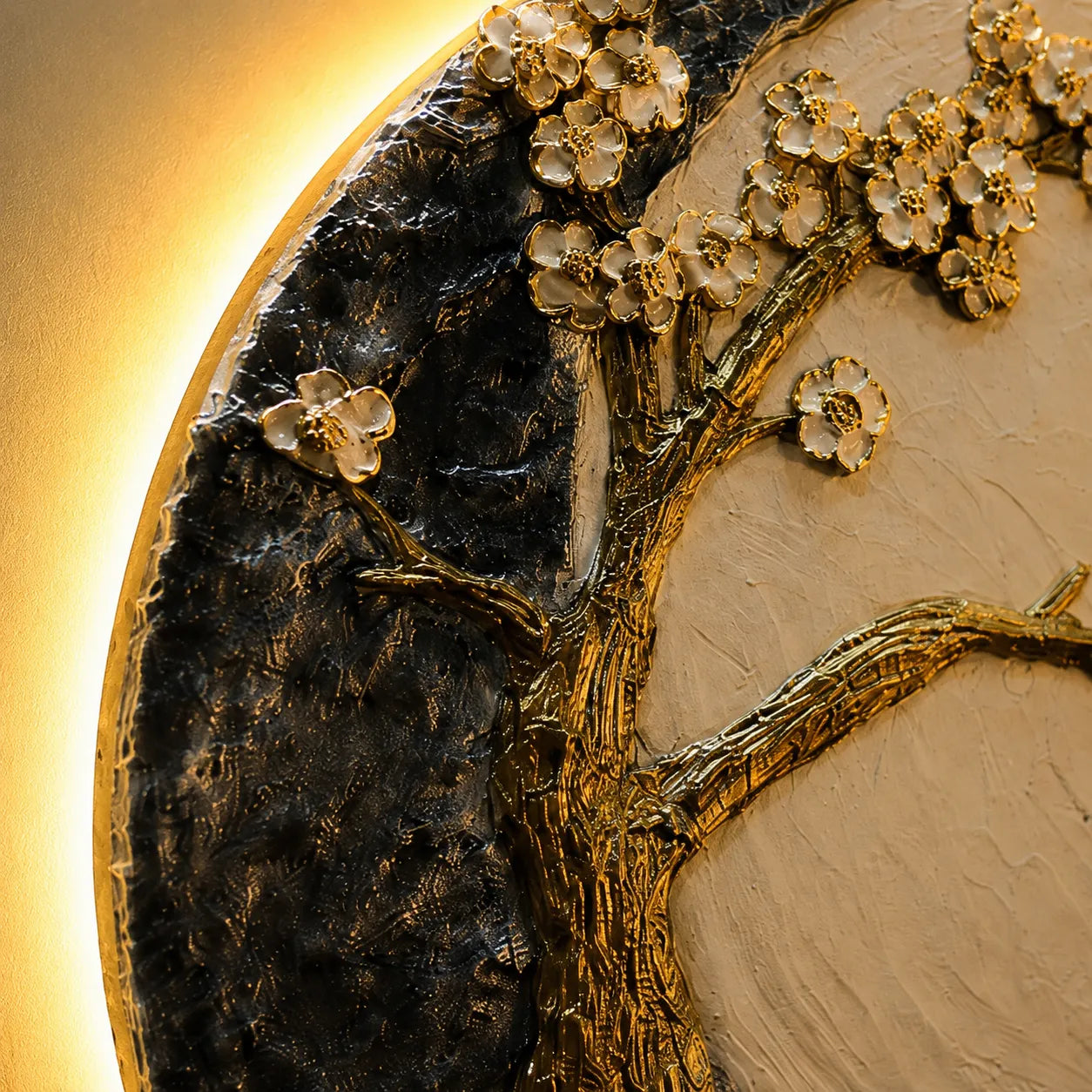 Decorative wall art with gold tree and flowers on a textured background