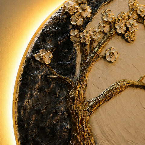 Decorative wall art with gold tree and flowers on a textured background