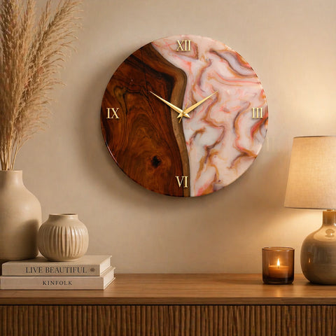 Decorative wall clock with wooden and marble design on a shelf with books and a lamp.