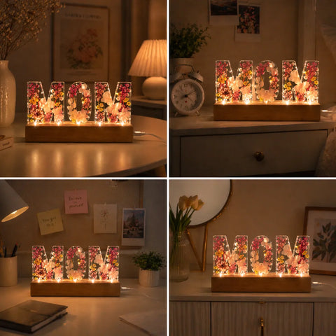 Decorative floral letter lights spelling 'MOM' in a home setting.