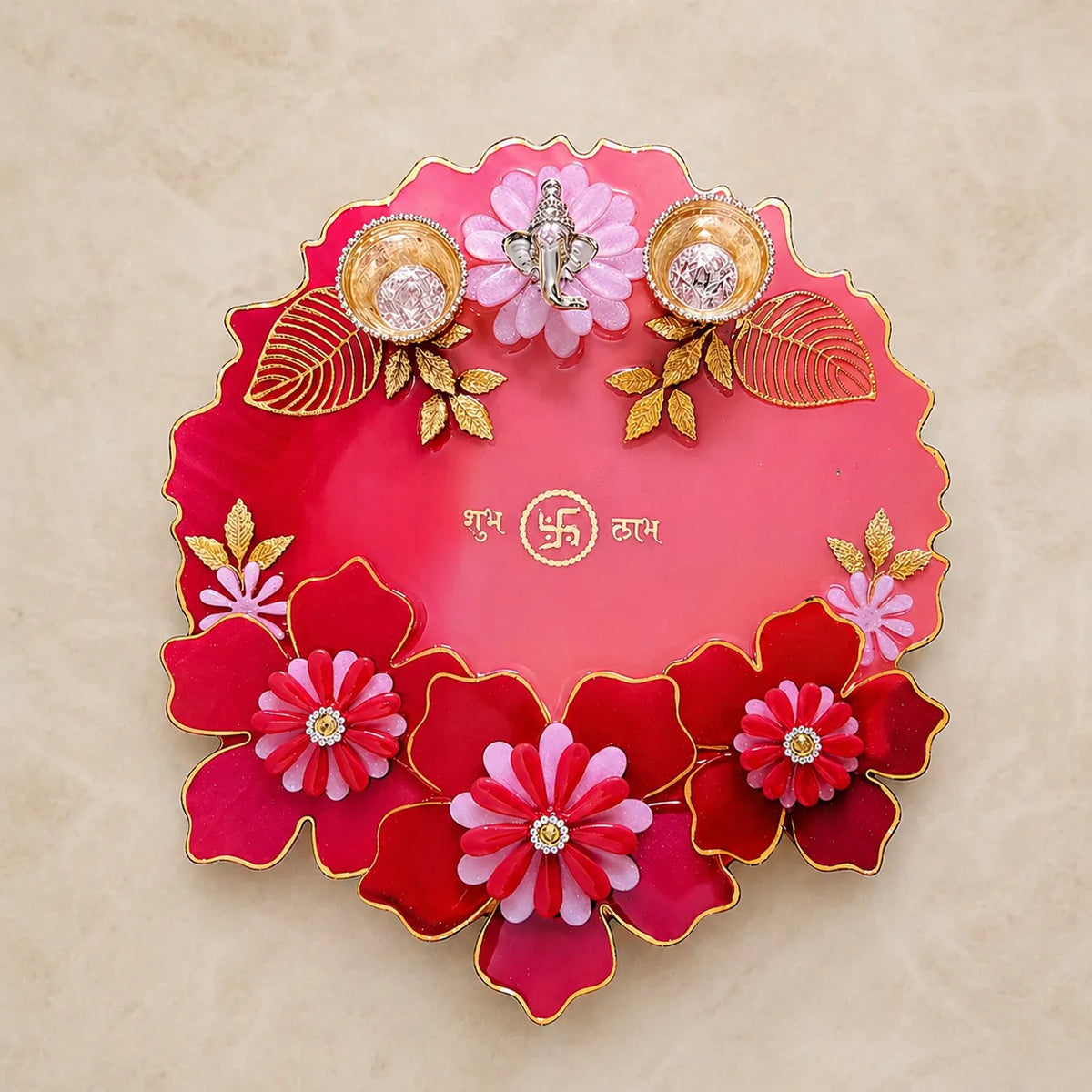8 inch resin pooja thali in pink red with gold accents and ganesha design decorative festive plate