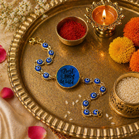 Bracelet with blue evil eye design on a decorative tray with candles and flowers