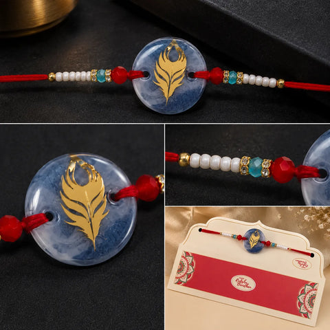 Decorative bracelet with a gold leaf design on a dark background
