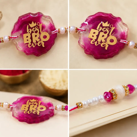 Pink rakhi with 'best bro ever' text on a beige background
