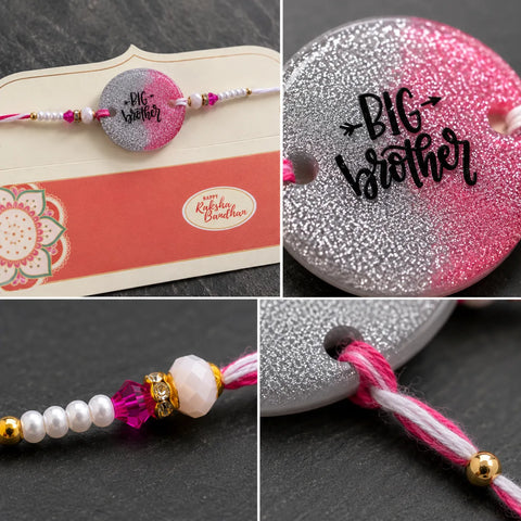 Rakhi with 'Big Brother' text on a decorative card, close-up of text and beads.