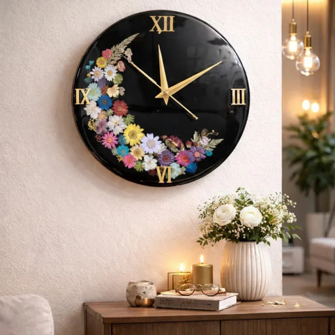 Decorative wall clock with floral design on a wall in a living room setting.
