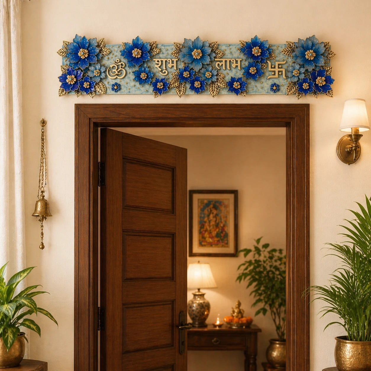 Decorative wall hanging with blue flowers and gold elements above an open wooden door.