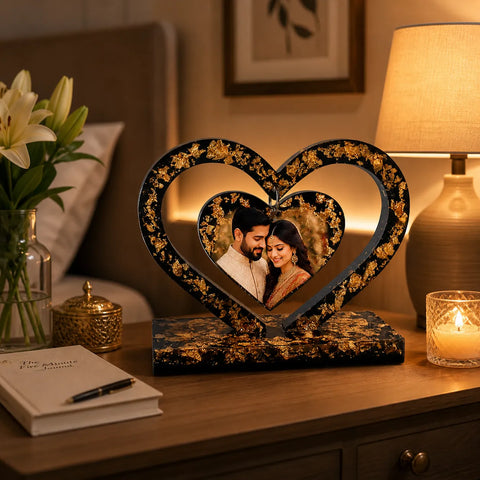 customized centre hanging heart resin photo frame with gold flakes placed on bedside table romantic couple home decor
