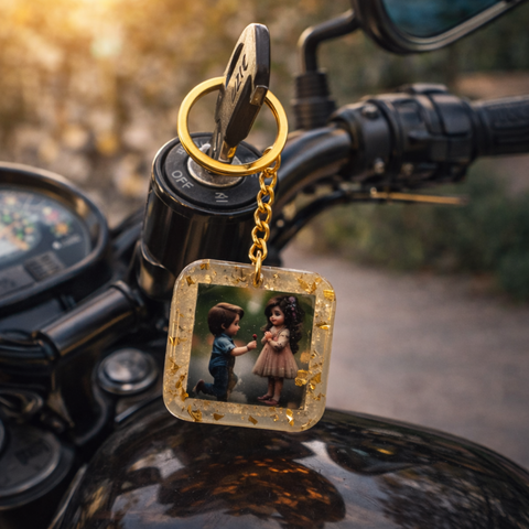 Keychain with a photo of two children on a motorcycle handlebar