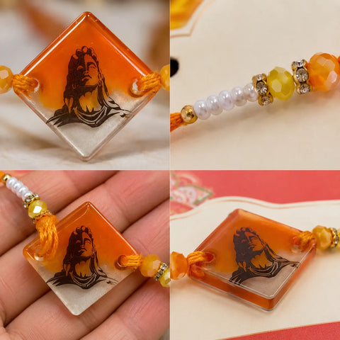 Collage of a decorative item with a square orange piece featuring a black design, held by a hand.
