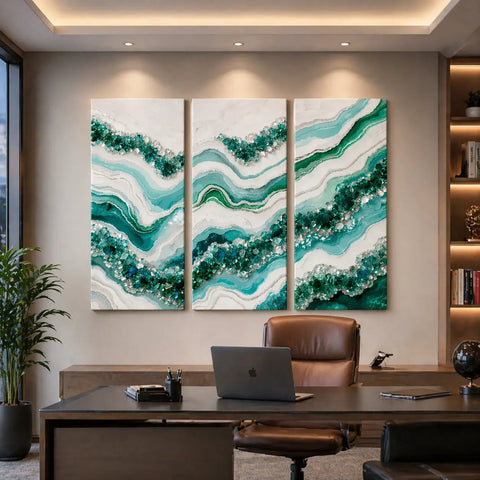 Modern office interior with a large abstract art piece on the wall above a desk.