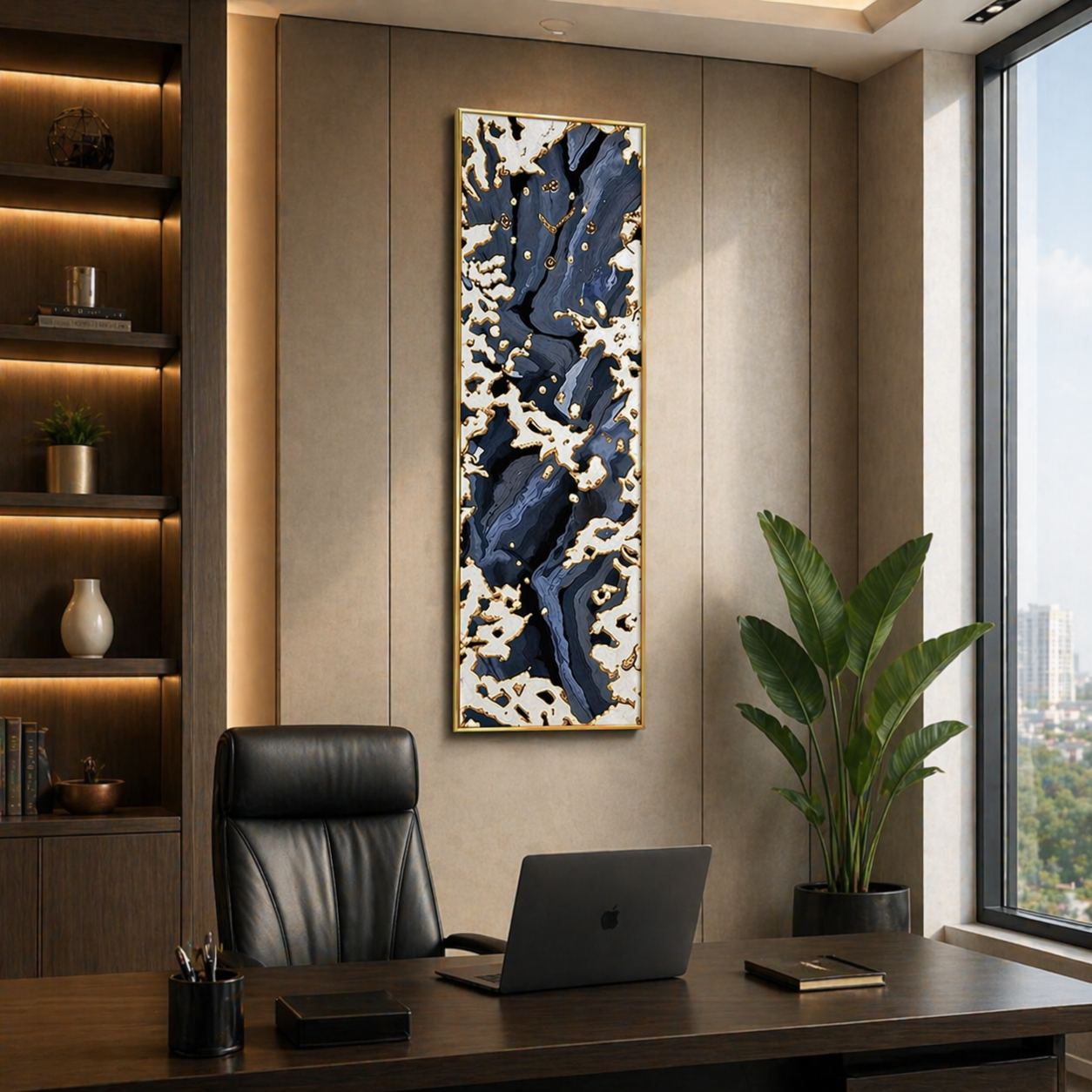Modern office interior with a desk, chair, laptop, and decorative wall art.