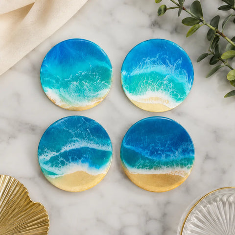 Ocean theme handmade resin coaster set with glossy beach wave artwork and gold sand detailing for tea, coffee, and table décor.