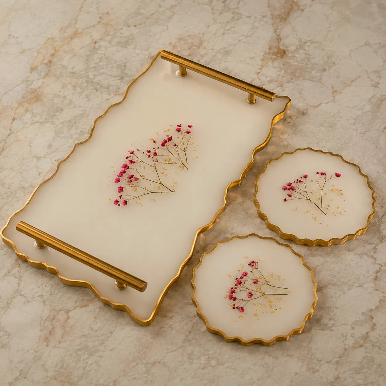 Decorative tray with floral design on a marble surface