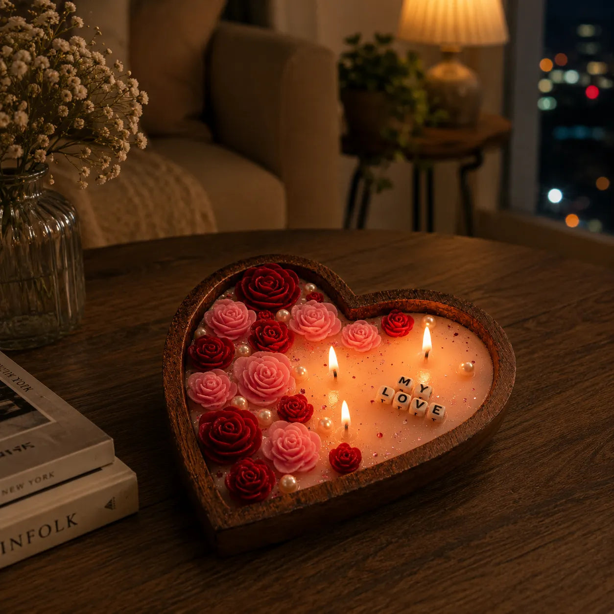 Heart-shaped candle holder with roses and 'My Love' text on a wooden table.