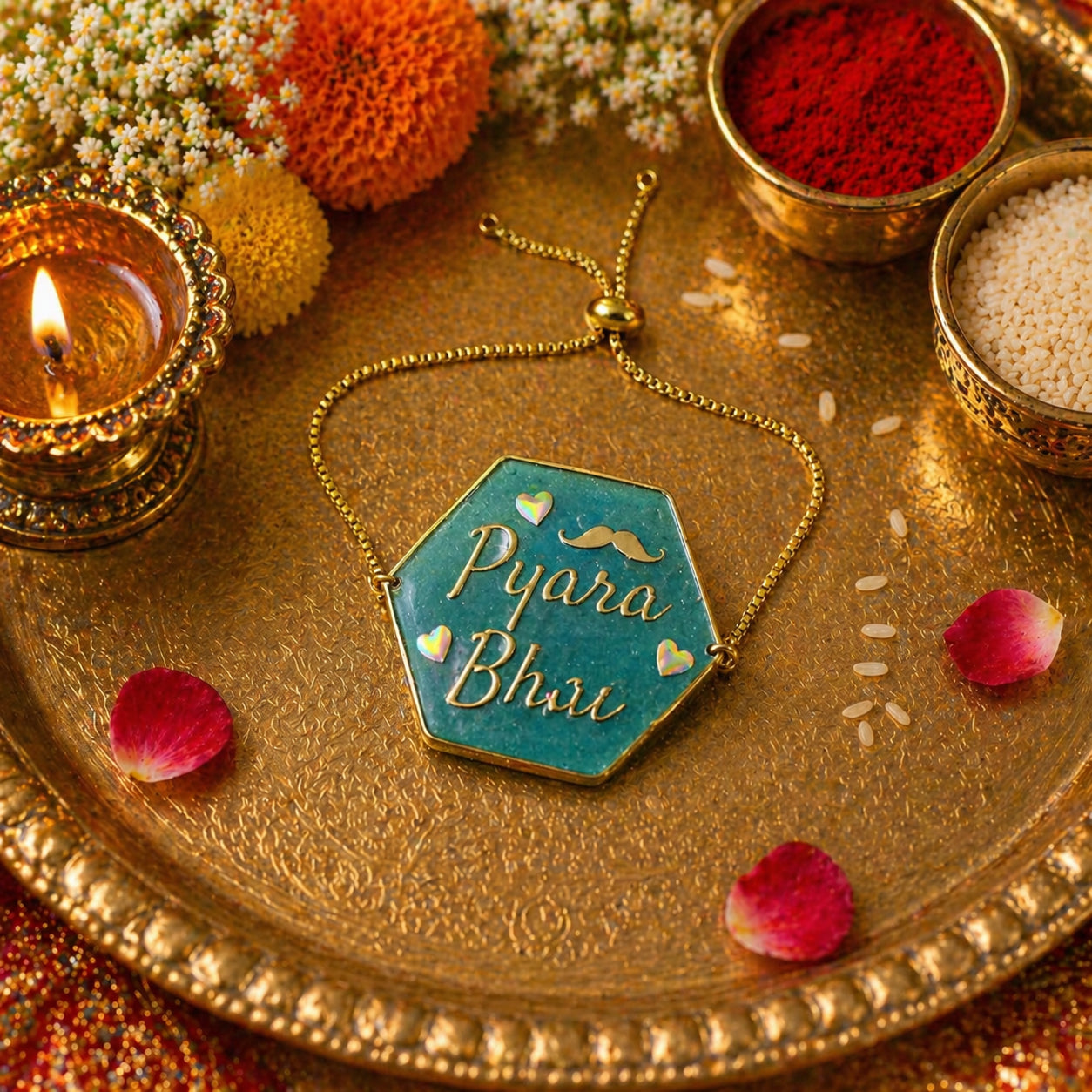Hexagonal pendant with 'Pyara Bhai' text on a decorative tray with candles and flowers
