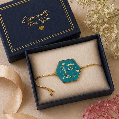 Bracelet with 'Pyara Bhai' on a blue box labeled 'Especially For You', surrounded by flowers.