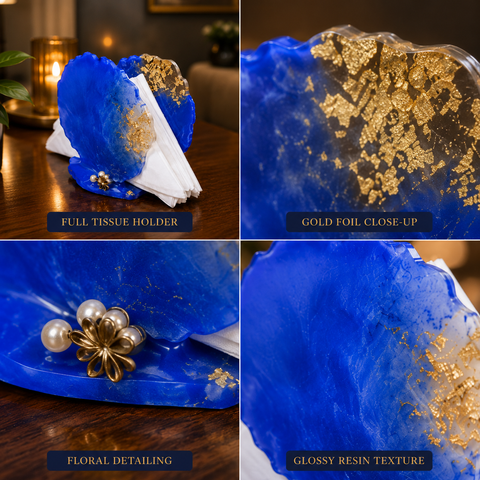 Blue tissue holder with gold foil and floral detailing on a wooden surface.