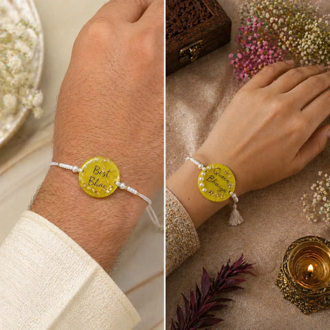 handmade yellow resin bhai bhabhi rakhi set worn on wrist with pearl lumba and festive raksha bandhan setup