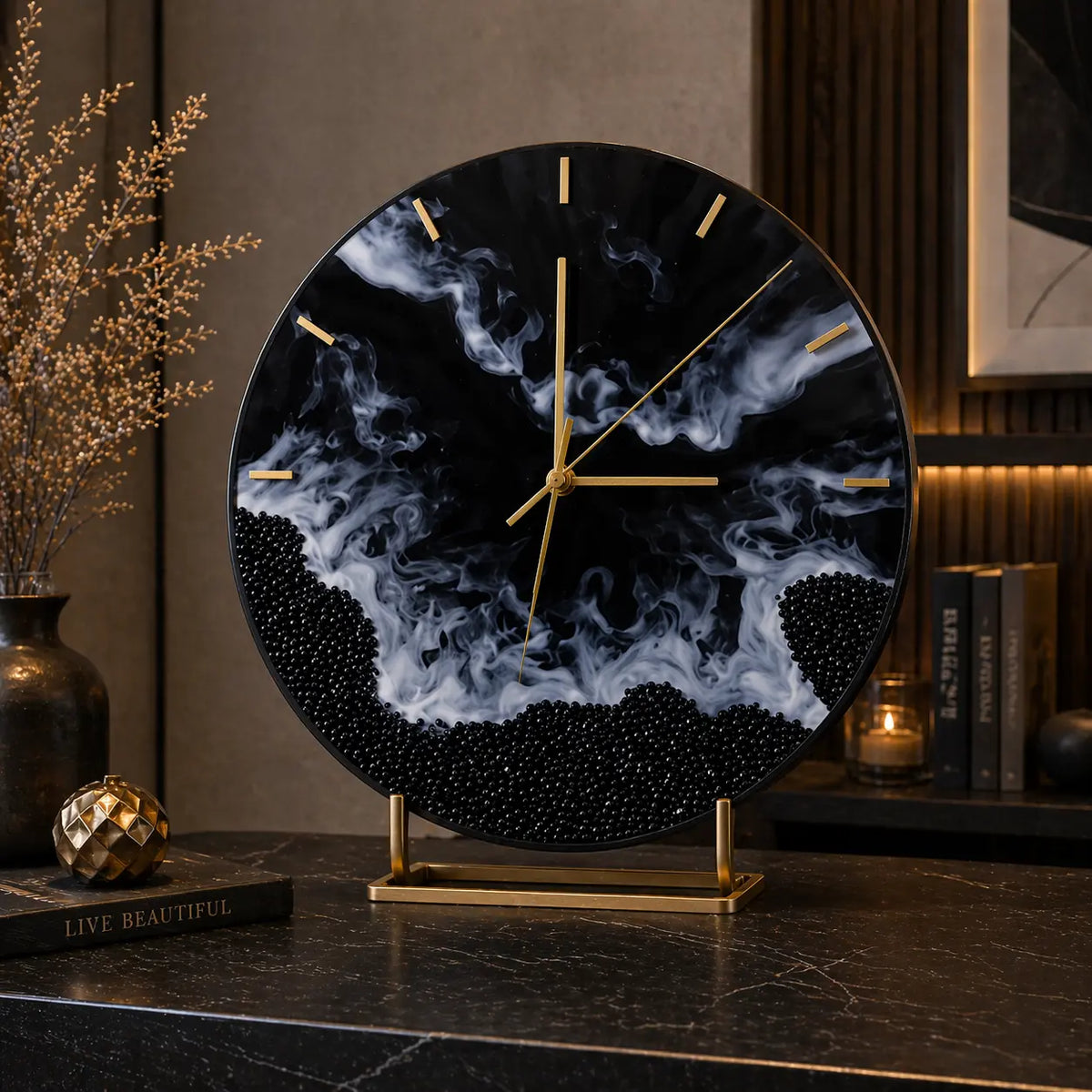 Decorative clock with black and white marbled design on a stand, placed on a surface.