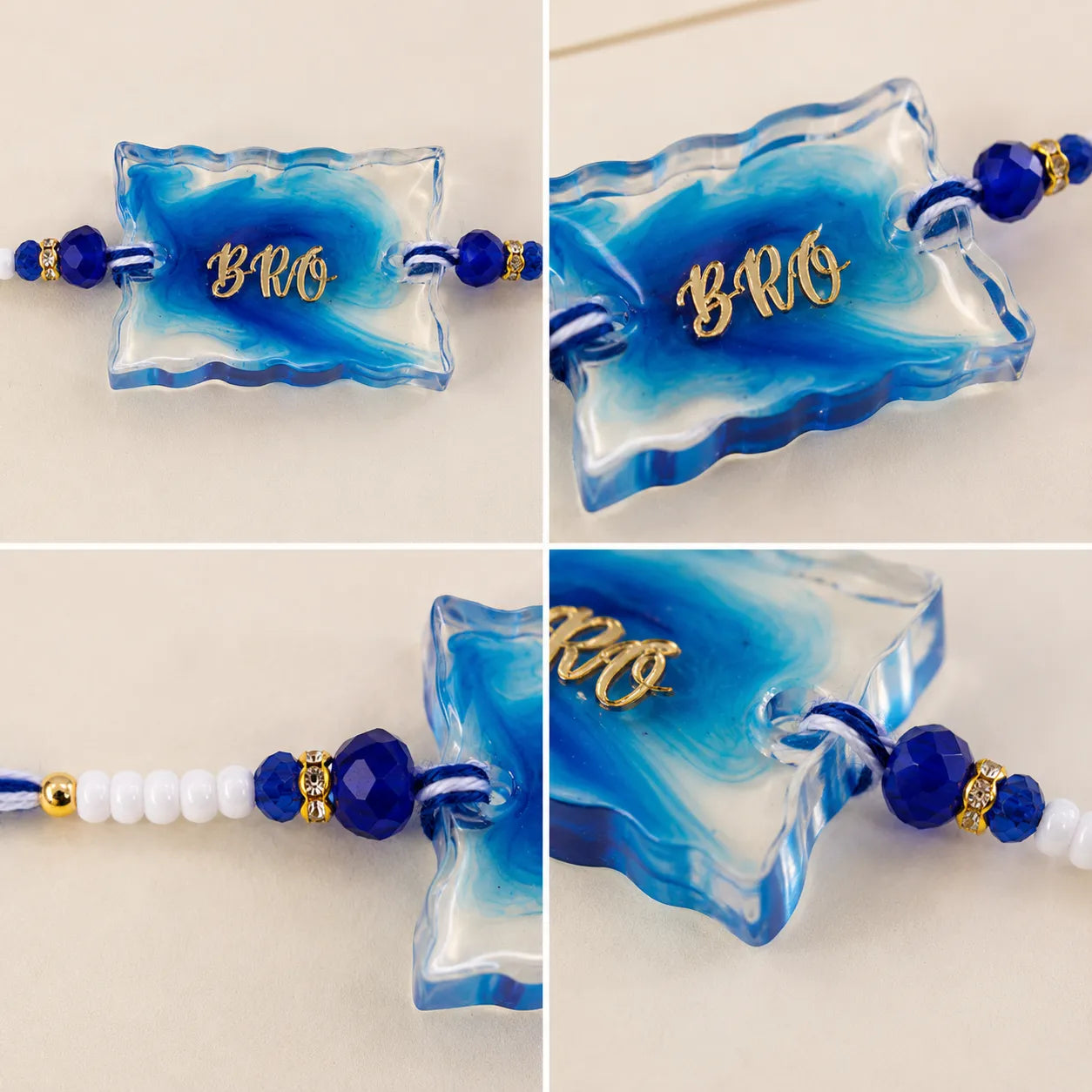 Blue and white marbled rakhis with 'BRO' text on a light background