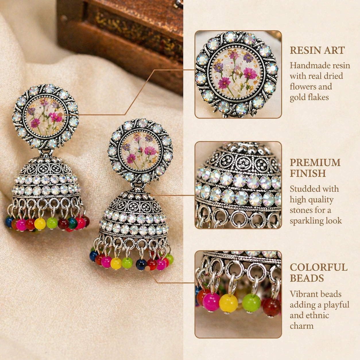 Decorative earrings with colorful beads and detailed design on a beige background