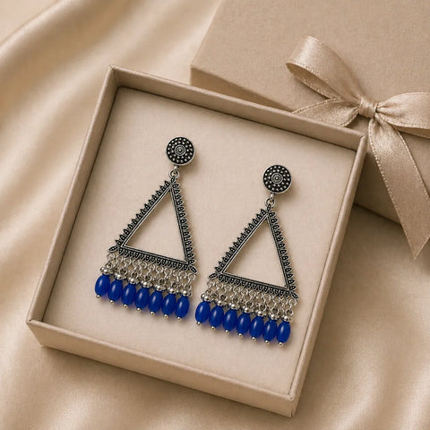 oxidised silver triangle drop earrings with blue beads in gift box jewellery packaging image