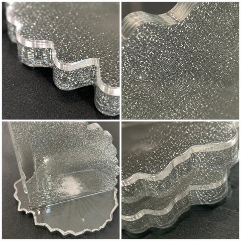 Collage of a glittery, textured plastic object on a black background