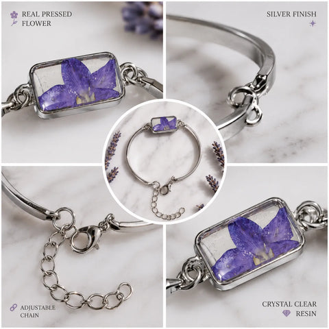 Collage of a bracelet with a real pressed flower and silver finish on a marble background.