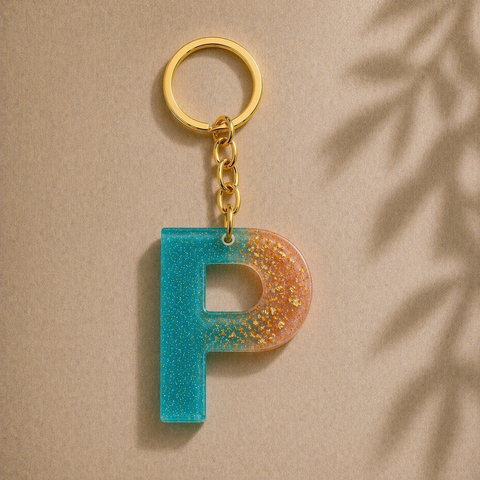 Keychain with letter 'P' design on a beige background