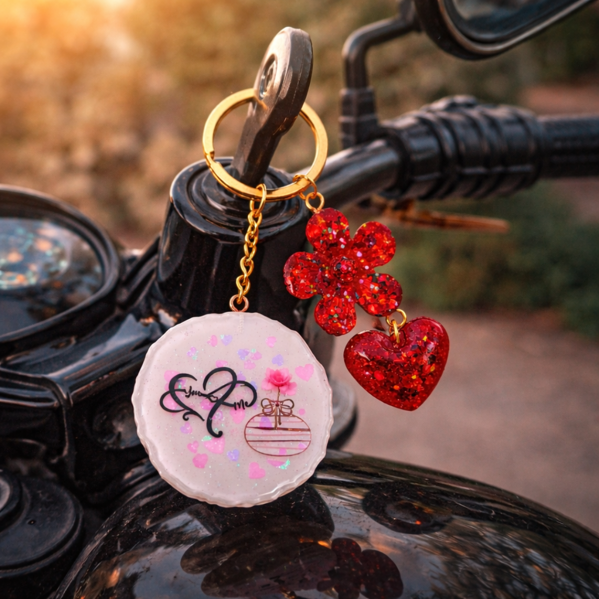 Decorative keychain with heart and flower charm on a motorcycle handlebar