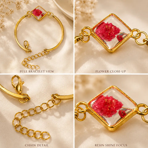 Gold bracelet with red flowers in resin on a beige background