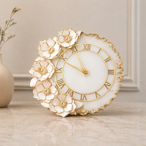 Decorative clock with floral design on a neutral background